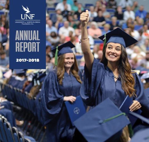 cover of 17-18 annual report with grad giving a thumbs up at commencement