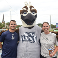 Ozzie mascot with two other people