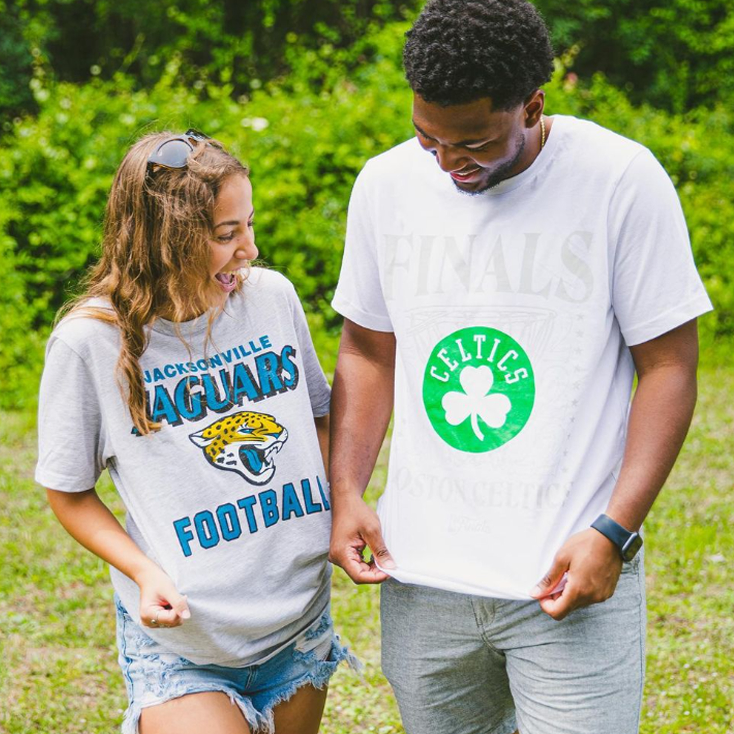 celia and jeremiah with their jags and celtics shirts on