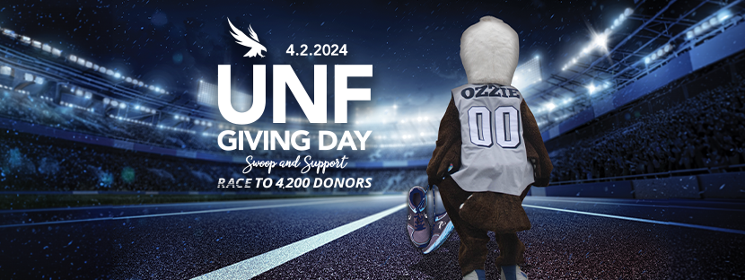 4.2.2024 UNF Giving Day Swoop and Support Race to 4200 Donors Ozzie Carrying his Running shoes