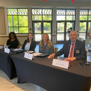 Judges seated for student presentations