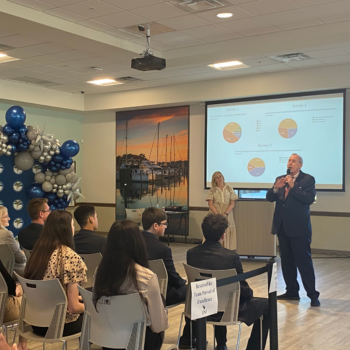 Mayor of Palm Coast giving a speech to audience