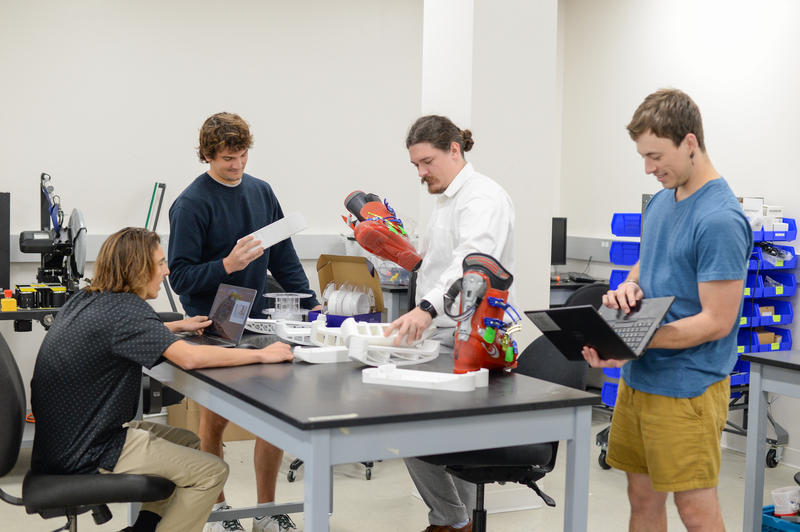 Engineering students working on project