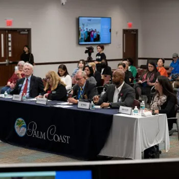 a table with guests speakers at the Innovation Challenge