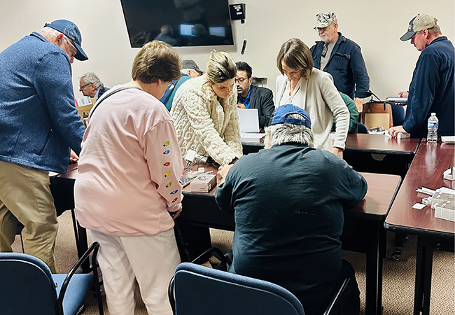 people working around a table