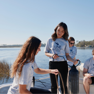 Students learning on a boat 