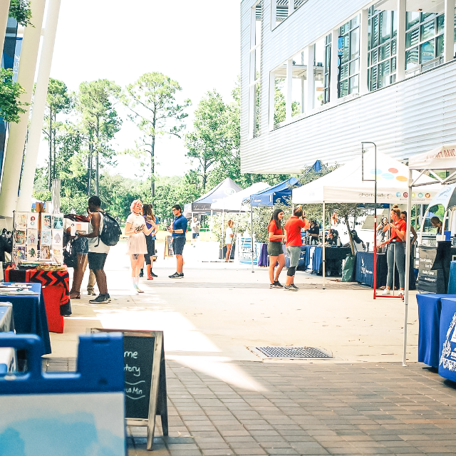 Students at UNF Market Days outside of the John A. Delaney Student Union