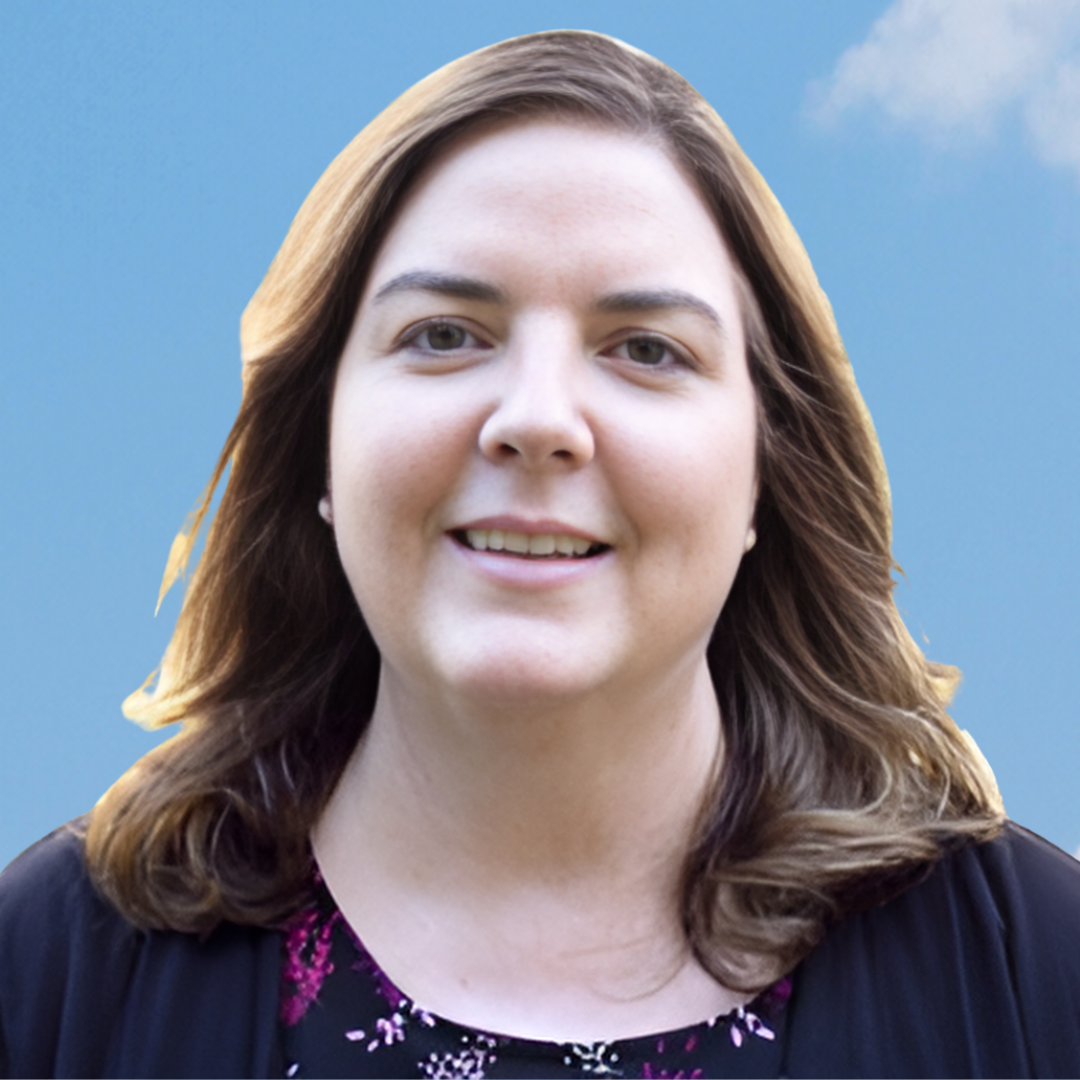 Deborah Kochanowski headshot, sky background