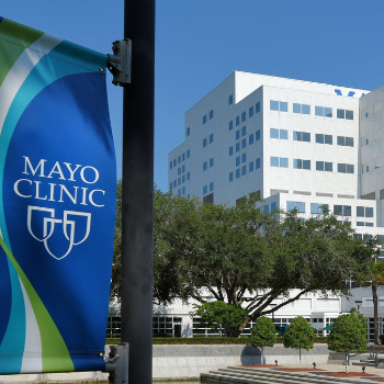 mayo clinic exterior of building with flag