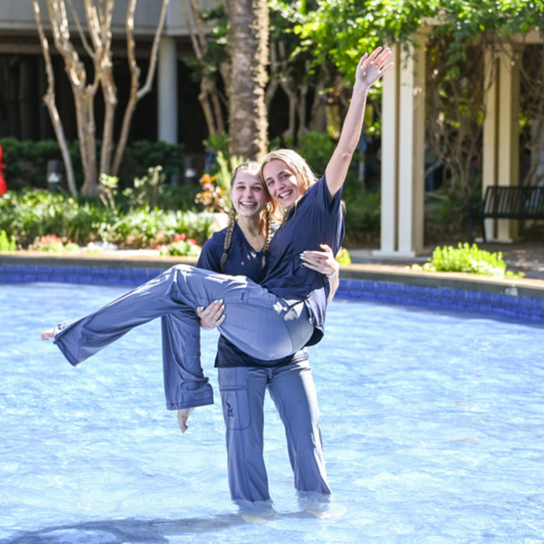 Two nursing students in the BCH fountain