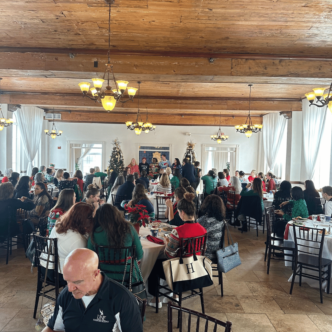 BCH Holiday Luncheon 2023 overview image of everyone eating at tables