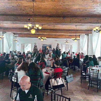 BCH Holiday Luncheon 2023 overview image of everyone eating at tables