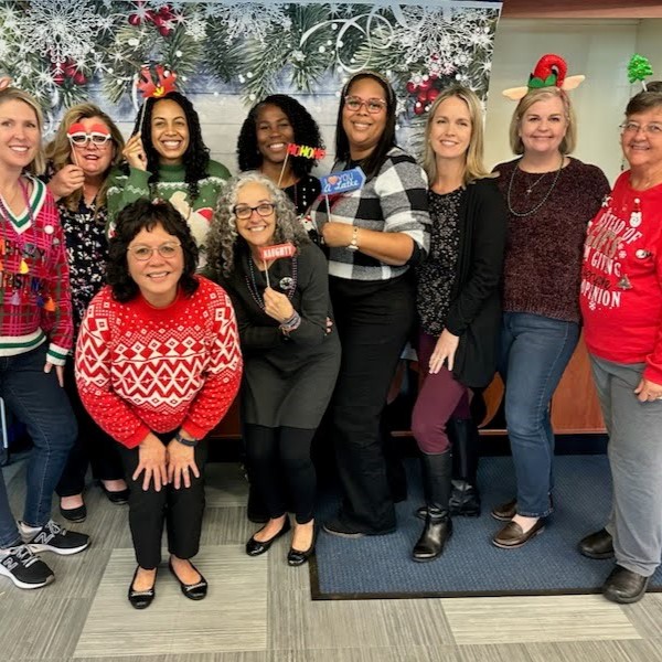 Group posing at a holiday party