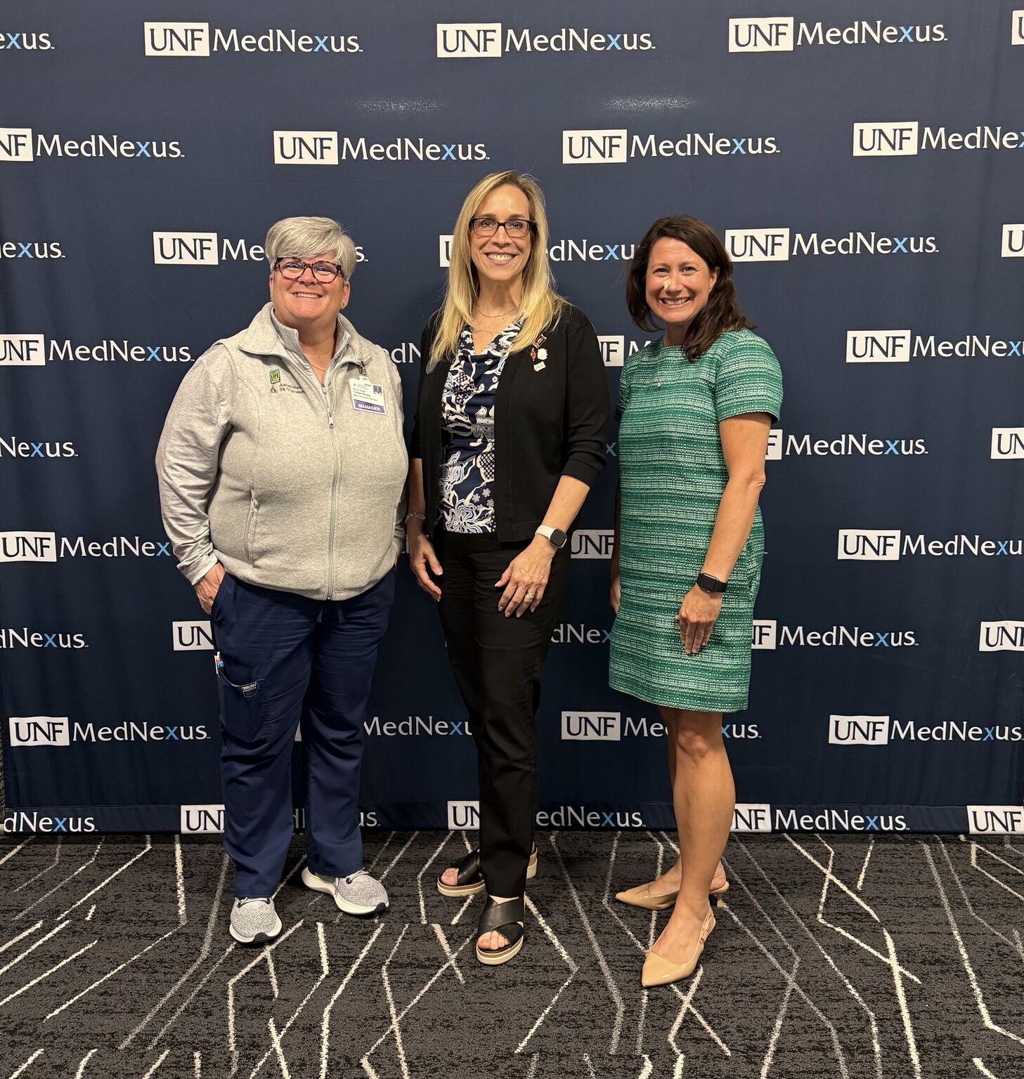 Valerie Morrison, Coleen Rickey and Kate Campbell at the UNF MedNexus Research Week event