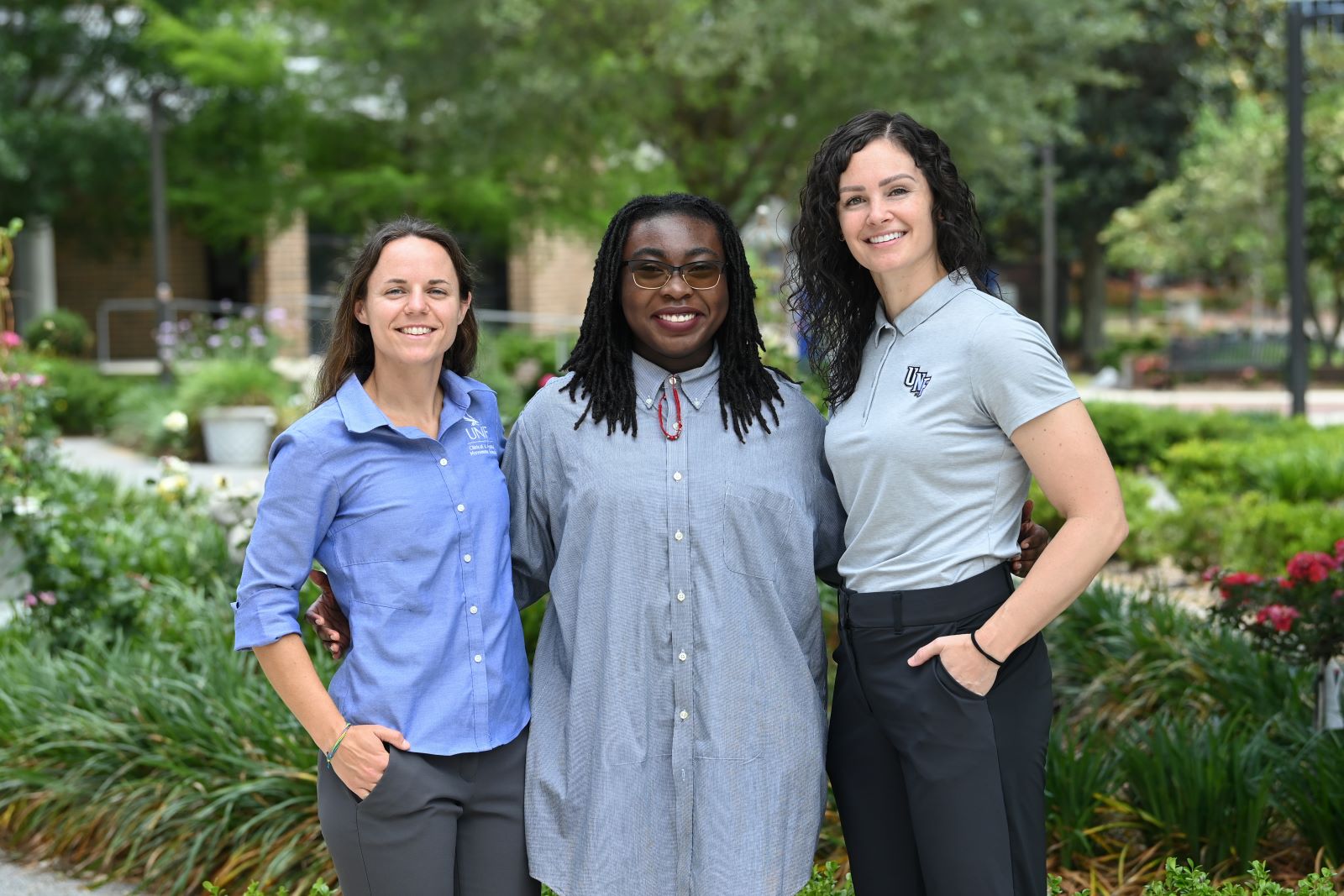 EIM research team, three women standing next to each other