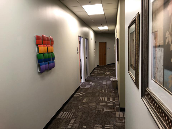 hallway with art on the wall