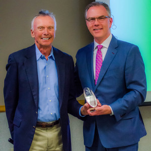 Hugh Tappan receiving alumni award