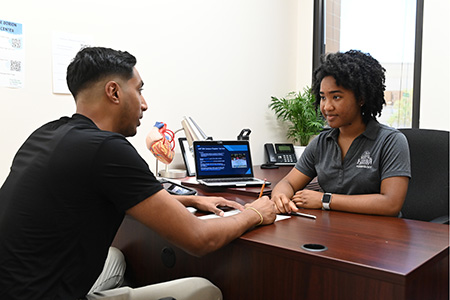 an advisor talking with a student