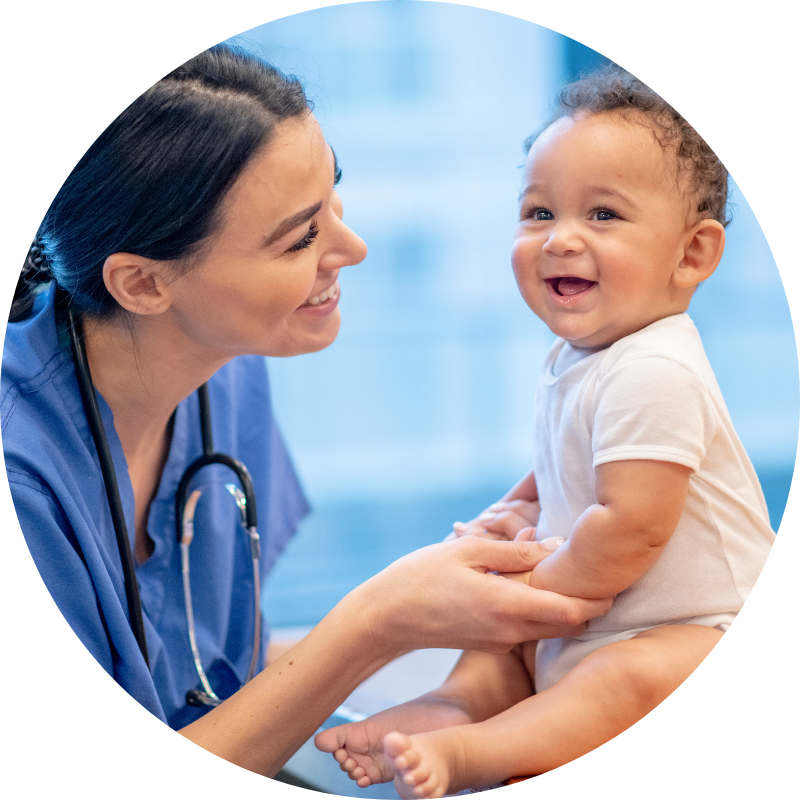 Nurse with a smiling baby
