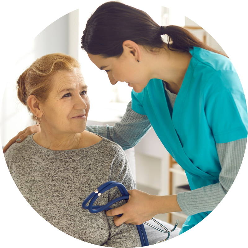 PMHNP Nurse talking with a patient with holding a stethoscope