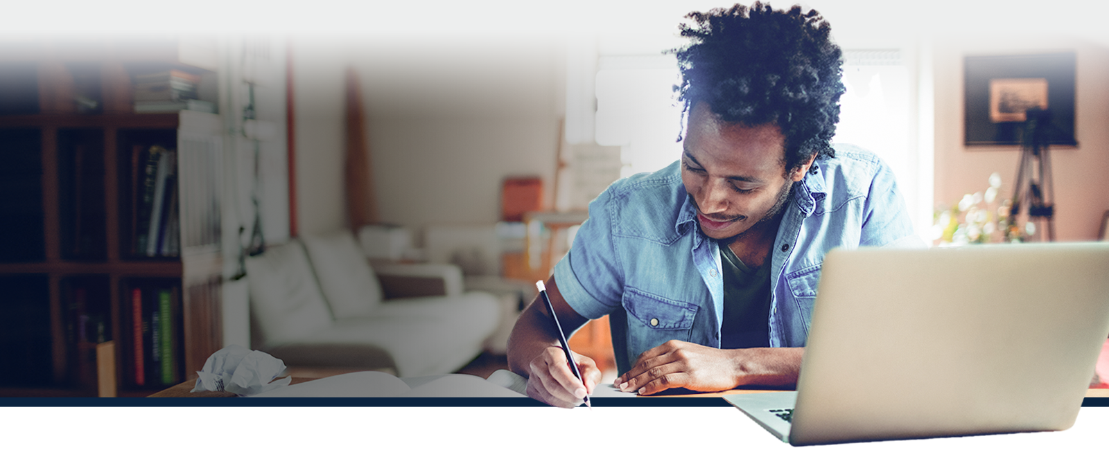 student studying with a laptop
