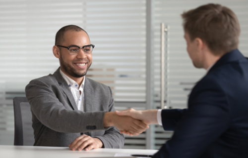 Male Dietitian Getting a job with a handshake