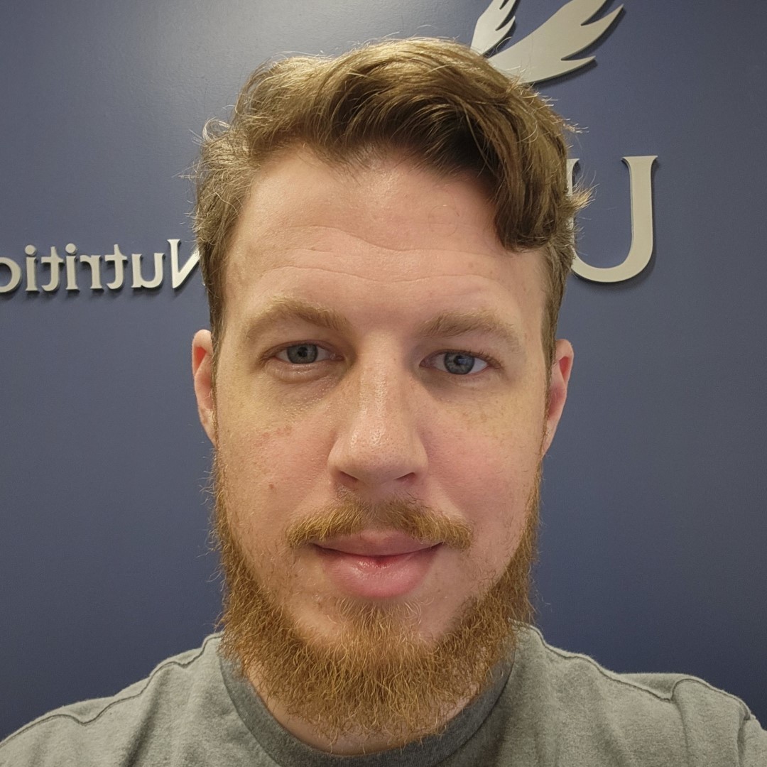 Headshot of Christian Merkley