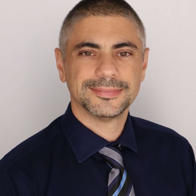Headshot of Dr. Cesar