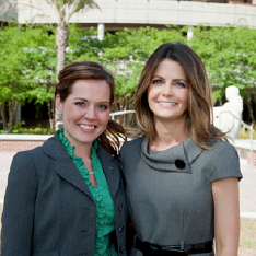 Two women standing together