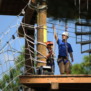 two people on the ropes course