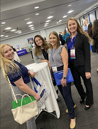 four students at a Career Services event
