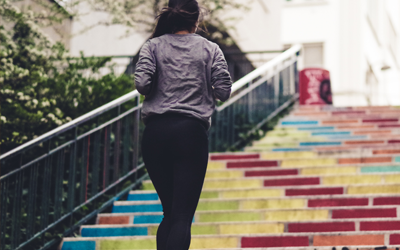 woman running up stairs