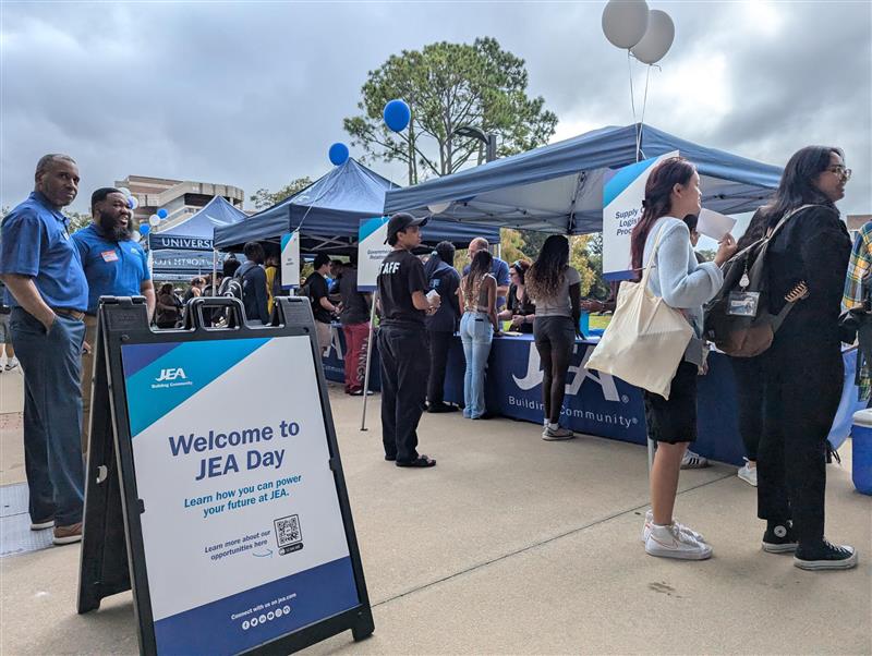 JEA Day at UNF, student line up to meet with JEA
