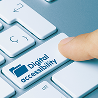 finger pressing digital accessibility key