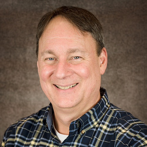 headshot of Chris Gay