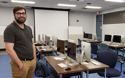 professor standing in the computer lab