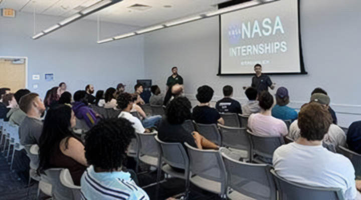 NASA representatives speaking with CCEC students in a campus classroom