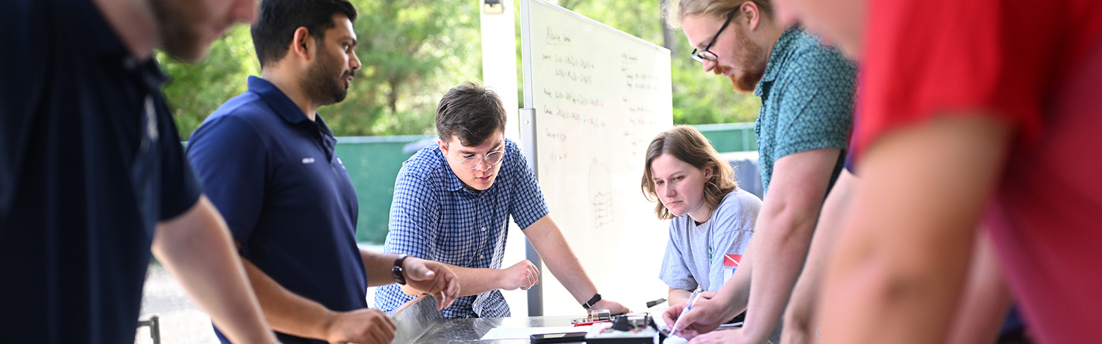 students working on an engineering project