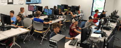 children at a computer summer camp