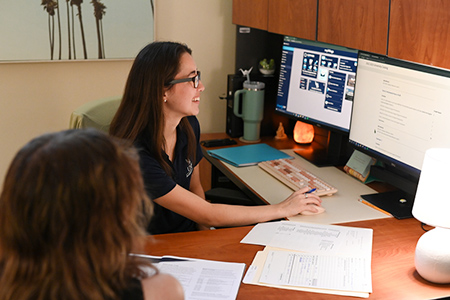 an academic advisor talking with a student
