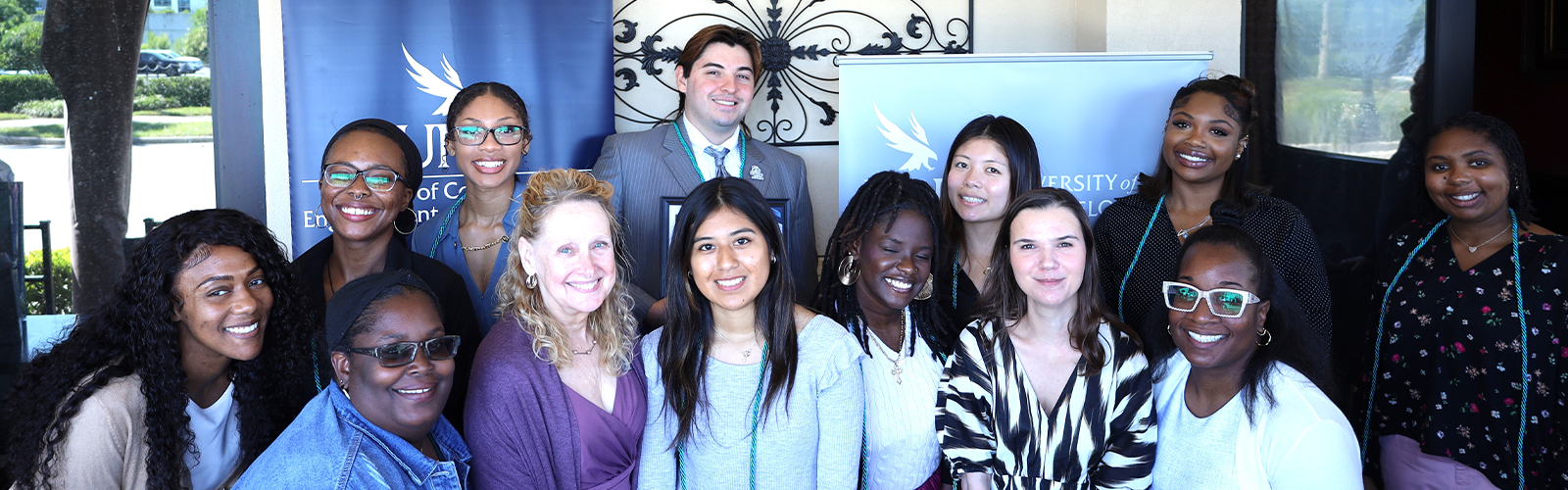 Group shot of the Connections mentors and mentees smiling