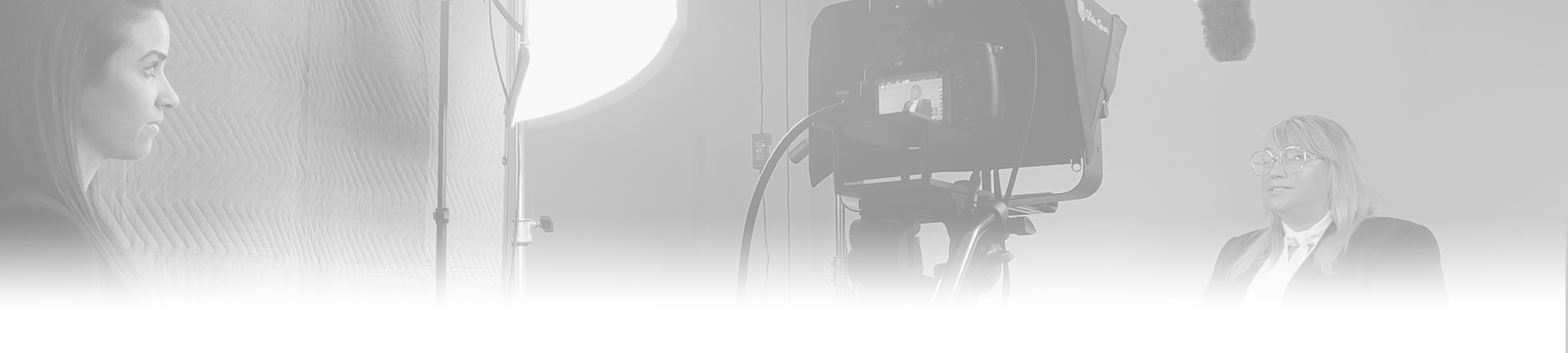 faculty recording a video in a studio