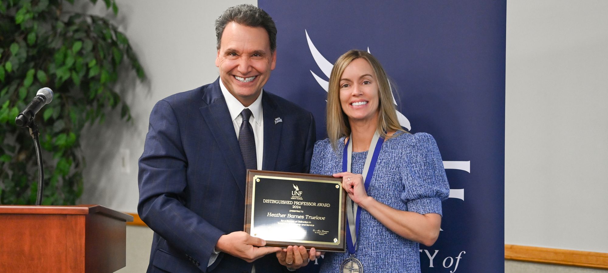 President Moez Limayem and Dr. Heather Barnes Truelove