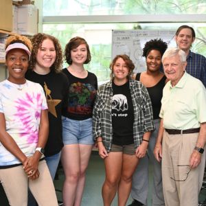 Jim Van Vleck and Students in a lab