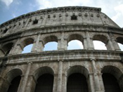 coliseum from Italy with clouds in the background