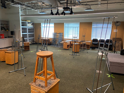 painting and drawing easels and stools in classroom