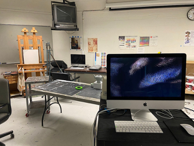 drawing and painting lab with mac and tv setup