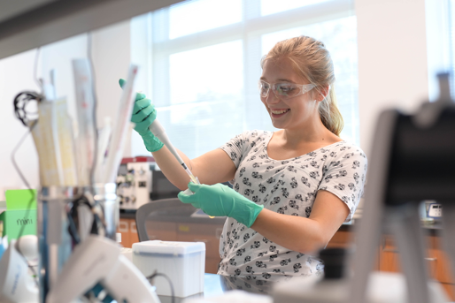 Student researcher in a chemistry laboratory.