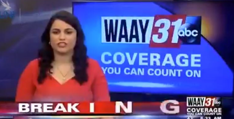 Alex Torres-Perez reports the news on camera.