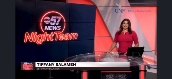 Tiffany Salamey in the studio with red dress